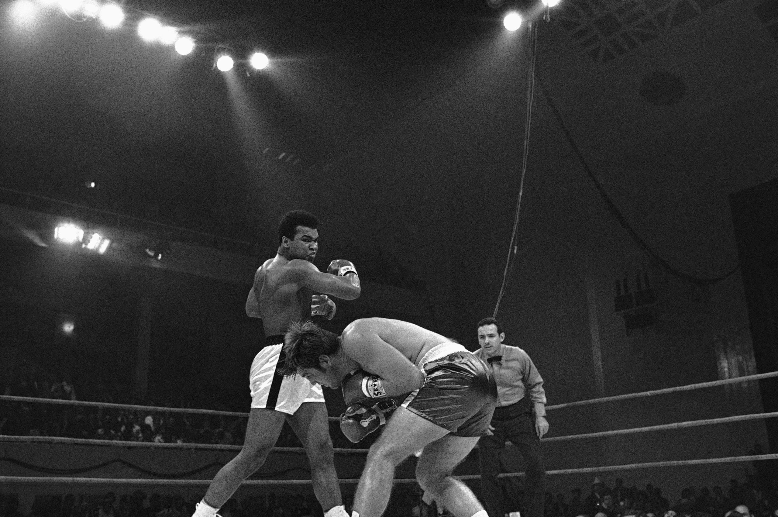 Muhammad Ali and Jerry Quarry       Boxing